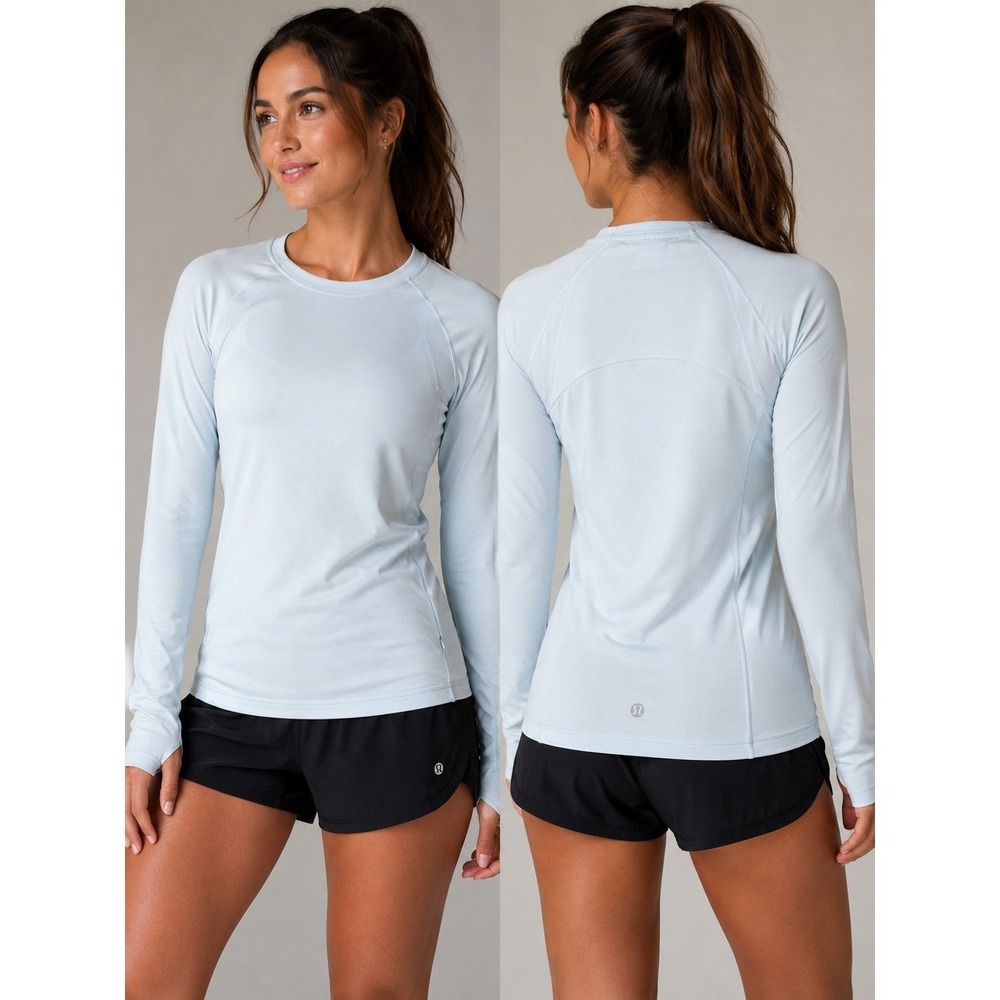 Lululemon Womens 10 Long Sleeve Running Top Light Blue Zip Pocket Athletic Shirt